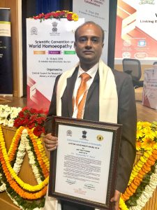 Dr Gopal I Patel collecting the Award on behalf of Dr Ramanlal P Patel